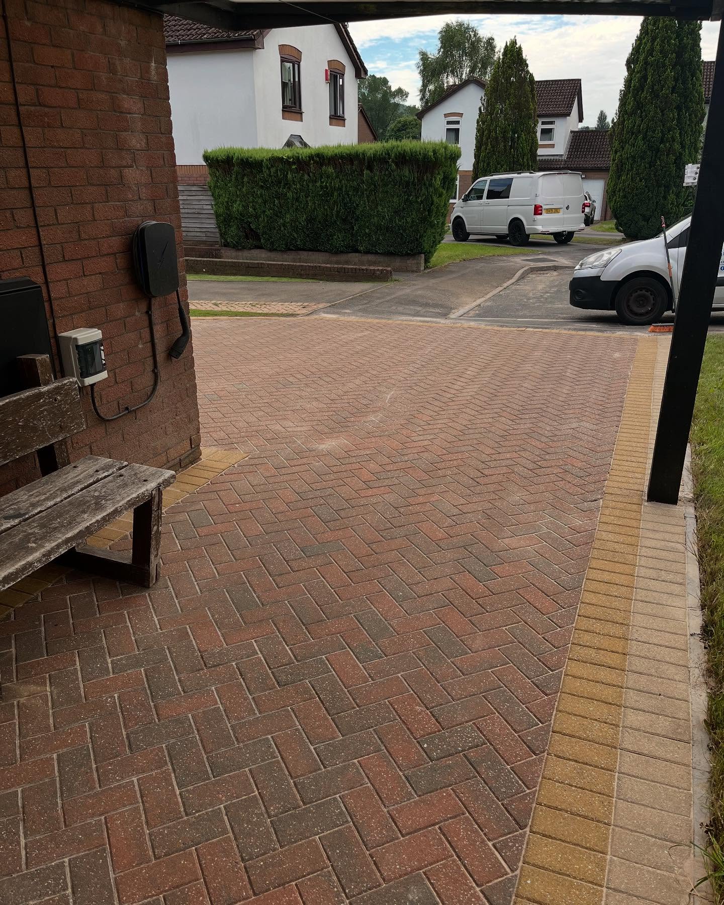 Finished red block driveway under carport