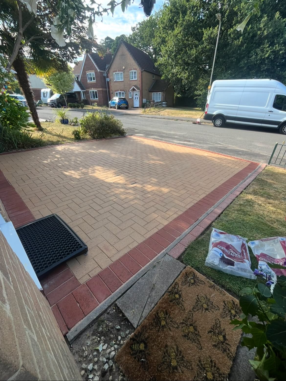 Finished tan and red block driveway
